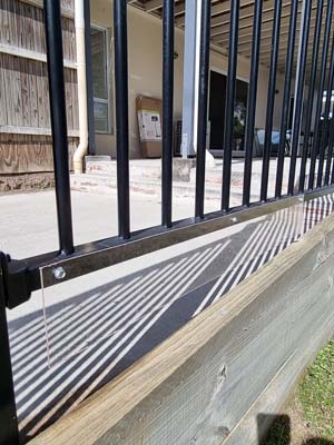 use perspex to block gap under fence